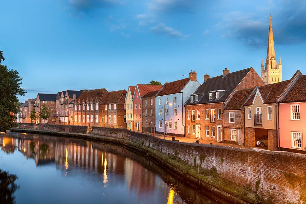 Historic town houses at night on Quay Side in Norwich, Norfolk